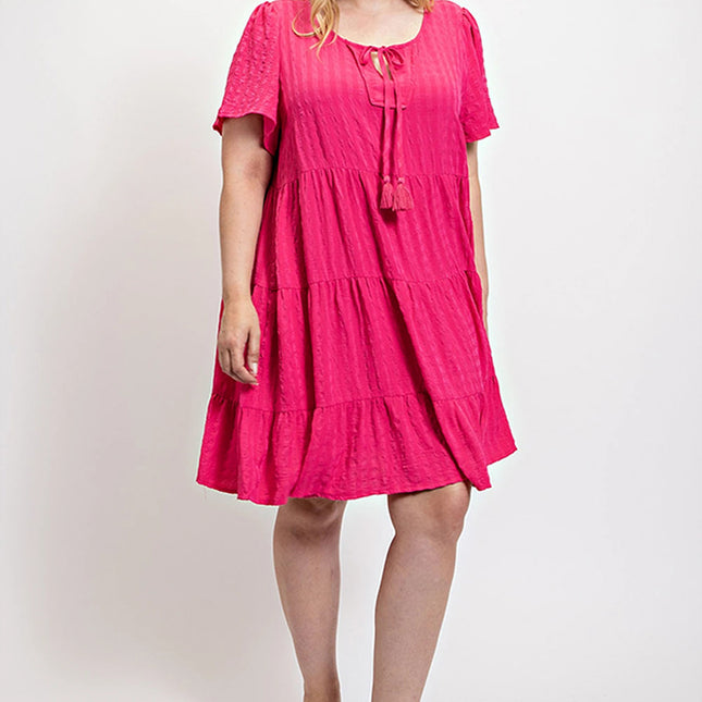 Textured woven tiered dress with tassel tie and pockets